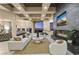 Spacious living room with city views, fireplace, and large sectional sofa at 1228 Stellar Rim Ct, Henderson, NV 89012