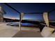 Infinity pool with a covered lounge area, perfect for enjoying city views at sunset at 1228 Stellar Rim Ct, Henderson, NV 89012