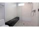 Clean and modern walk-in shower with built-in bench at 1228 Stellar Rim Ct, Henderson, NV 89012