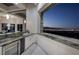 Wet bar with granite countertops and stunning city views at 1228 Stellar Rim Ct, Henderson, NV 89012