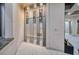 Modern wine cellar with a custom metal and glass rack system at 1228 Stellar Rim Ct, Henderson, NV 89012