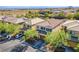 Aerial view of a two-story house with a solar panel system and a landscaped yard at 10633 Mount Blackburn Ave, Las Vegas, NV 89166