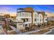 Modern three story building with a rooftop deck, located in a new community at 639 Spotted Falcon St, Las Vegas, NV 89138