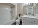 Well-lit bathroom featuring a shower-tub combo and bright white vanity at 3125 N Buffalo Dr # 1089, Las Vegas, NV 89128