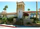 Beautifully landscaped community clubhouse with attractive architectural details at 3125 N Buffalo Dr # 1089, Las Vegas, NV 89128