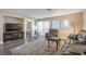 Inviting living room with plush seating, stylish rug, and view into bedroom at 3125 N Buffalo Dr # 1089, Las Vegas, NV 89128