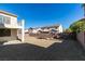 Large backyard with gravel and block wall at 26 Drawback St, Henderson, NV 89012