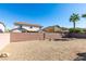 Large backyard with gravel and block wall at 26 Drawback St, Henderson, NV 89012