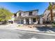 Two-story house with attached garage and landscaping at 26 Drawback St, Henderson, NV 89012