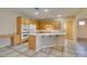 Bright kitchen with island, double oven, and ample cabinetry at 26 Drawback St, Henderson, NV 89012