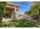 Landscaped backyard oasis with pool and patio at 33 Promontory Ridge Dr, Las Vegas, NV 89135