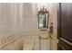 Elegant powder room with stone sink and tile at 33 Promontory Ridge Dr, Las Vegas, NV 89135