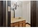 Upscale bathroom with double vanity and decorative mirror at 33 Promontory Ridge Dr, Las Vegas, NV 89135