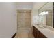 Bathroom with tub, shower, vanity, and mirror at 33 Promontory Ridge Dr, Las Vegas, NV 89135