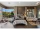 Primary bedroom with sitting area and hardwood floors at 33 Promontory Ridge Dr, Las Vegas, NV 89135