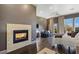 Primary bedroom with fireplace and sitting area at 33 Promontory Ridge Dr, Las Vegas, NV 89135