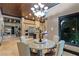 Charming breakfast nook with granite table and kitchen views at 33 Promontory Ridge Dr, Las Vegas, NV 89135