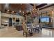 Spacious dining area with kitchen island and views at 33 Promontory Ridge Dr, Las Vegas, NV 89135