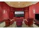 Luxurious home theater with plush seating and large screen at 33 Promontory Ridge Dr, Las Vegas, NV 89135