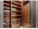 Built-in wooden bookshelves and cabinets at 33 Promontory Ridge Dr, Las Vegas, NV 89135