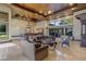 Open living room with a stunning chandelier and comfortable seating at 33 Promontory Ridge Dr, Las Vegas, NV 89135