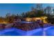 Stunning pool with waterfall feature and integrated spa at 33 Promontory Ridge Dr, Las Vegas, NV 89135