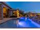 Luxury resort-style pool and spa at night at 33 Promontory Ridge Dr, Las Vegas, NV 89135