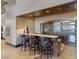 Custom wet bar with wine storage and seating at 33 Promontory Ridge Dr, Las Vegas, NV 89135
