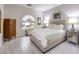 Guest bedroom with mirrored nightstands and window at 4 Kennesaw Rd, Henderson, NV 89052