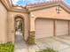 Two-car garage with double doors and a gated entry at 4 Kennesaw Rd, Henderson, NV 89052