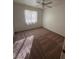 Simple bedroom offering neutral carpet, a sunny window and ample wall space at 5025 Vista Loma Way, North Las Vegas, NV 89031