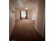 Cozy bedroom boasts neutral carpet, a ceiling fan, and a window for natural light at 5025 Vista Loma Way, North Las Vegas, NV 89031