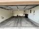 The garage has an automatic door and room for vehicle and storage at 7961 Alta Lima Valley Ct, Las Vegas, NV 89178