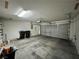 The garage has an automatic door and room for vehicle and storage at 7961 Alta Lima Valley Ct, Las Vegas, NV 89178
