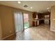 A kitchen featuring wood cabinetry, modern appliances, and recessed lighting at 7961 Alta Lima Valley Ct, Las Vegas, NV 89178