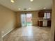 Eat in kitchen area with tan tile floors, recessed lighting, and a sliding glass door at 7961 Alta Lima Valley Ct, Las Vegas, NV 89178