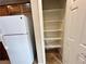 Pantry area offers shelving for organizing food and kitchen essentials at 7961 Alta Lima Valley Ct, Las Vegas, NV 89178