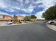 Street view of the neighborhood showcasing the well-maintained roads and desert landscaping at 7961 Alta Lima Valley Ct, Las Vegas, NV 89178
