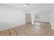 Bright bedroom with laminate floors and mirrored closet doors at 8517 Bayland Dr, Las Vegas, NV 89134