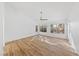 Bright bedroom with large windows offering natural light and wood-look floors at 8517 Bayland Dr, Las Vegas, NV 89134