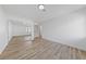 Bedroom featuring laminate wood flooring and a mirrored closet at 8517 Bayland Dr, Las Vegas, NV 89134