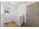 Bright laundry room with washer, dryer, and window at 8517 Bayland Dr, Las Vegas, NV 89134