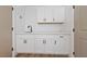 Mud room featuring white cabinets and quartz countertops at 8517 Bayland Dr, Las Vegas, NV 89134