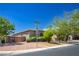 Single-story house with gated entry and landscaping at 5727 Golden Leaf Ave, Las Vegas, NV 89122