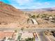 Property boasts a pool, and trampoline amidst desert landscape at 868 Marina Dr, Boulder City, NV 89005
