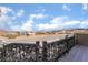 Lovely balcony view of neighborhood with mature landscaping and mountain backdrop at 868 Marina Dr, Boulder City, NV 89005