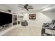Media room with large-screen TV, built-in shelving, and tiered seating at 868 Marina Dr, Boulder City, NV 89005