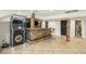 Finished basement features a bar with stone accents and custom lighting at 868 Marina Dr, Boulder City, NV 89005