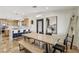 Open concept kitchen and dining area with breakfast bar and view at 868 Marina Dr, Boulder City, NV 89005
