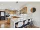 Bright kitchen with stainless steel appliances, breakfast bar and stylish bar seating at 868 Marina Dr, Boulder City, NV 89005